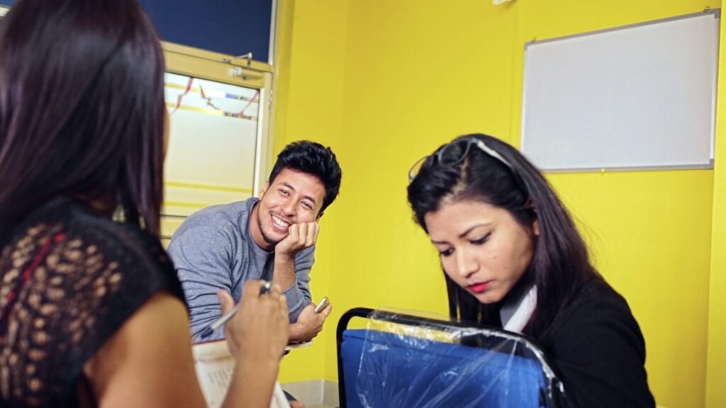 Still from Phokotia Tales: an office scene