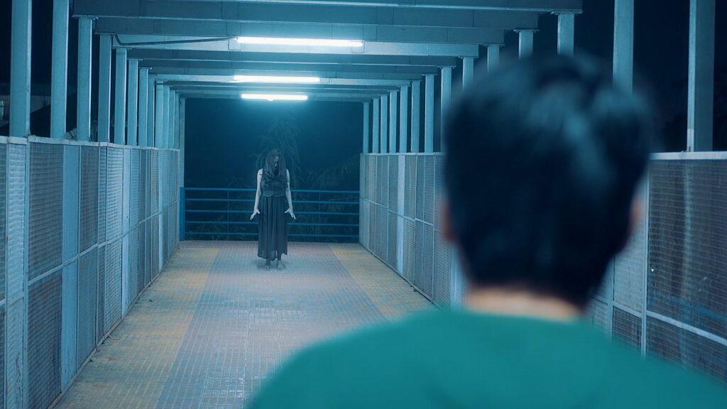 Still from My Love is Vengeance: a railway platform at night