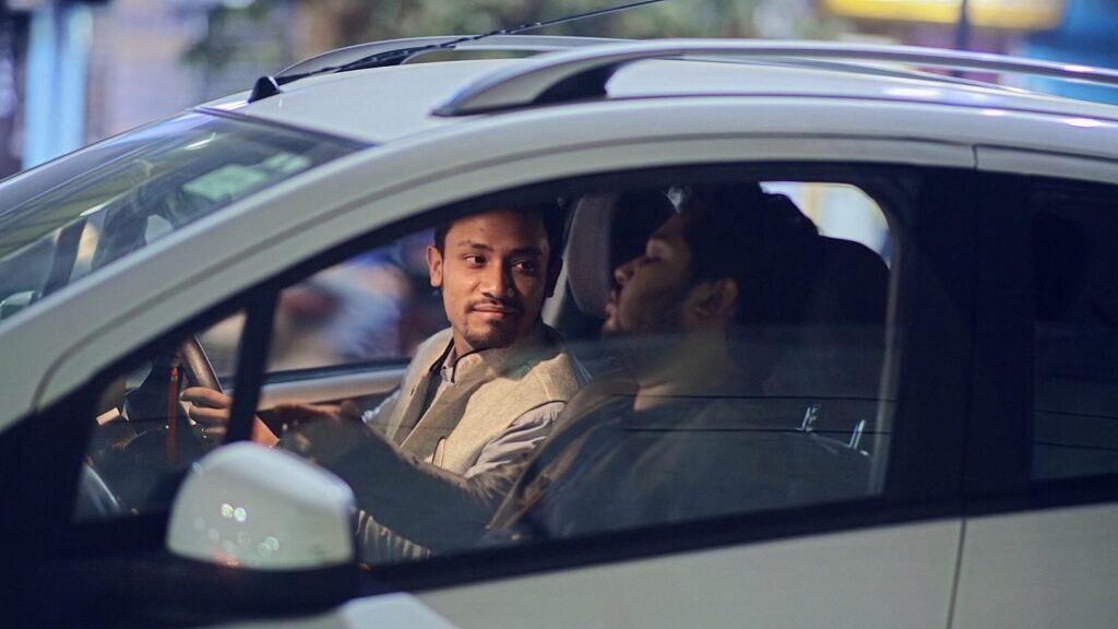 Still from Phokotia Tales: a scene in a car