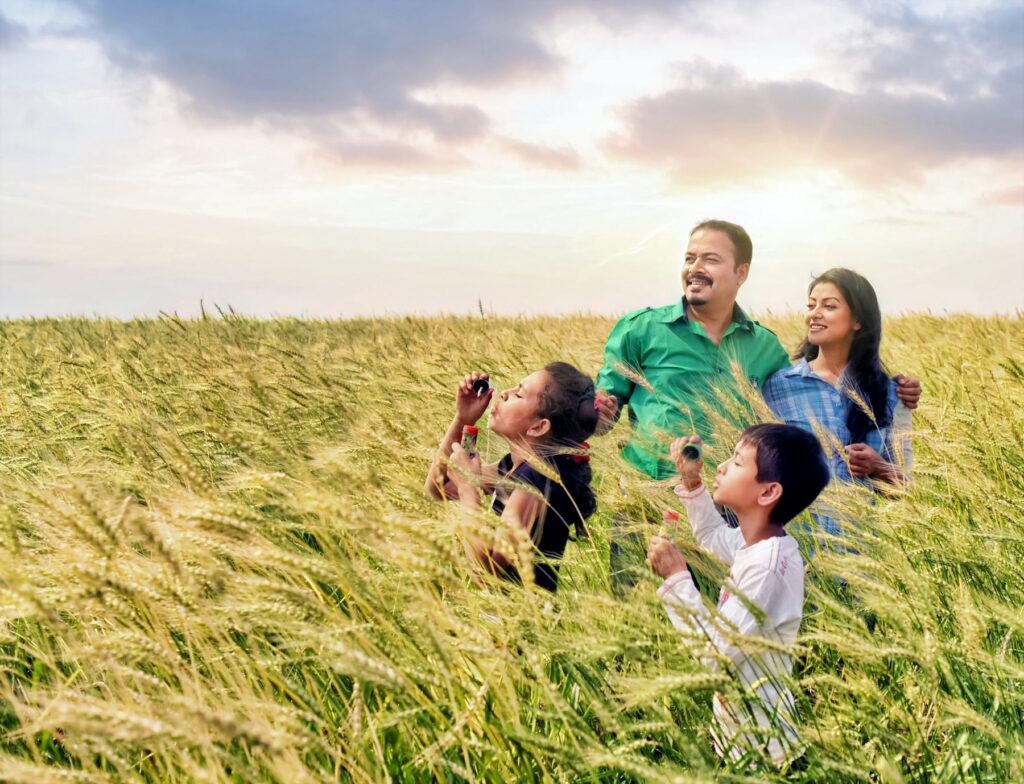 Avataran film still: family in a paddy field